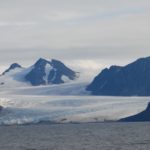a glacier-wrapped mountain