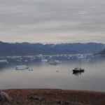 Polar Pioneer with icebergs