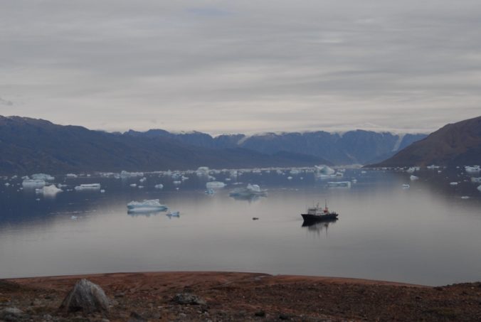 Polar Pioneer with icebergs